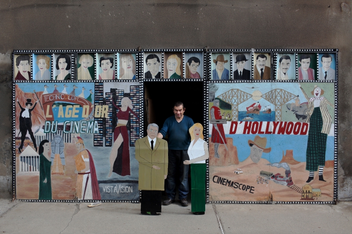 Guy Brunet in front of his house in France